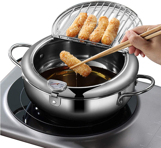 Japanese stainless steel frying pan with thermometer and lid.